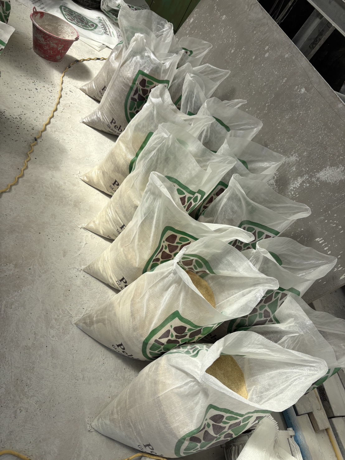 PebblePure glass filtration media in branded bags