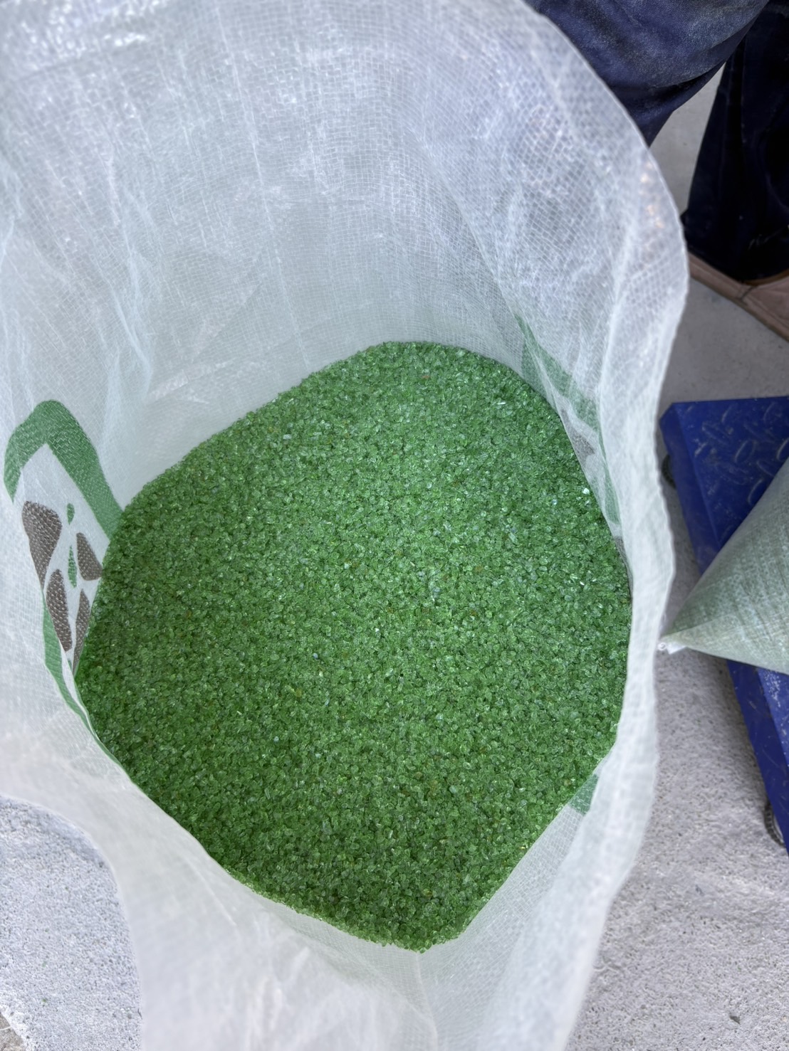 PebblePure green glass filtration media in its branded bag