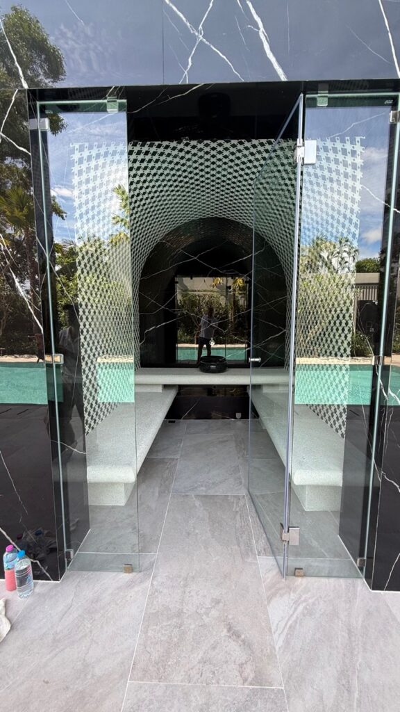 Entrance view of the steam-room seats at Laguna Homes