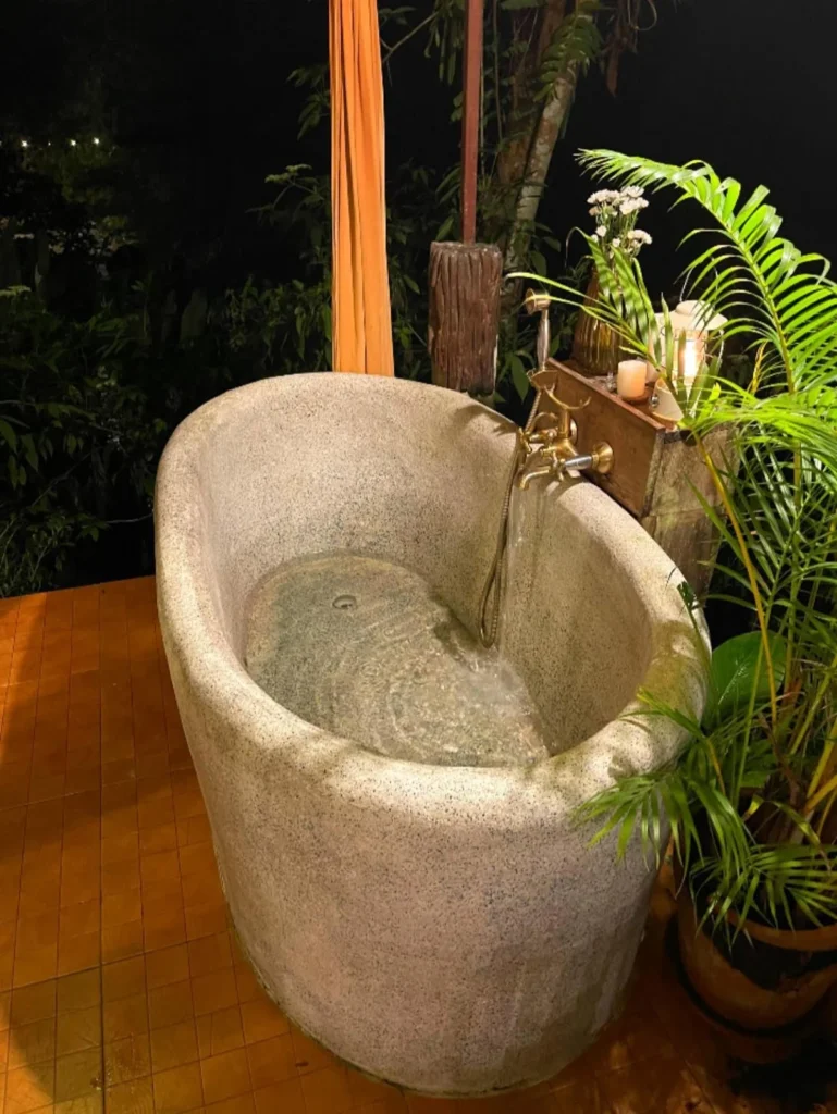 Channabot freestanding bath illuminated at night