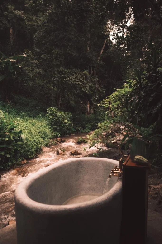 Channabot bath on a terrace beside a stream