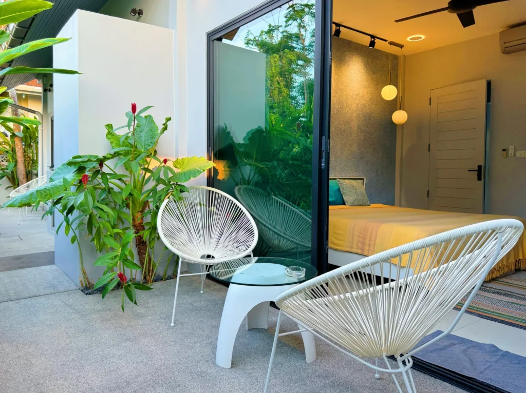 Custom PebbleGlass terrace beside a bedroom at a private villa in Phuket
