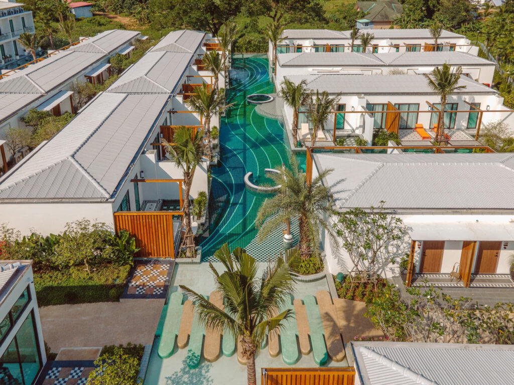 Aerial view of Sugar Marina Lagoon villas and pools, with the PebbleCrete stepping platforms in the foreground.
