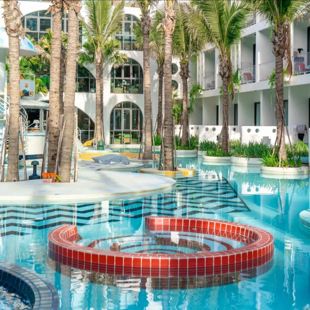 Water-level view of the pool and circular tiled seating at Sugar Marina POP - Kata Beach